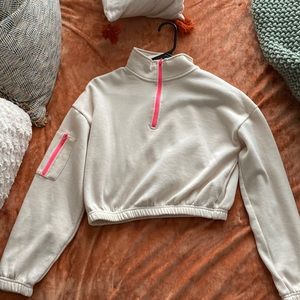 Cream and pink sweat shirt